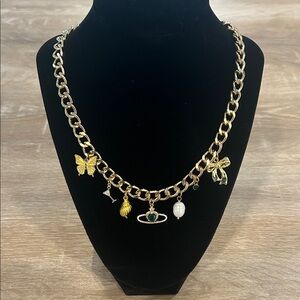 Gold Charm Necklace with Butterfly and Bow Accents